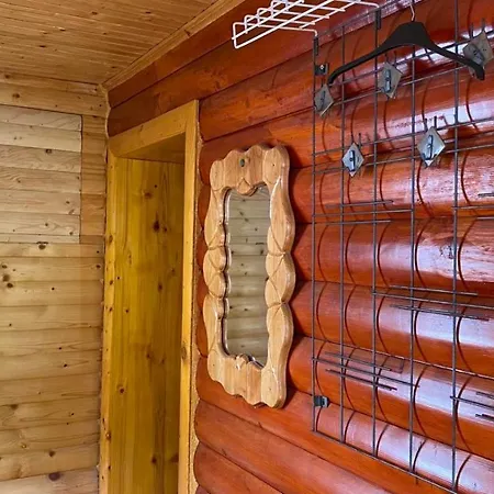 над греблею *