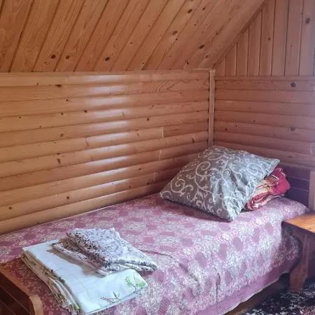 над греблею *